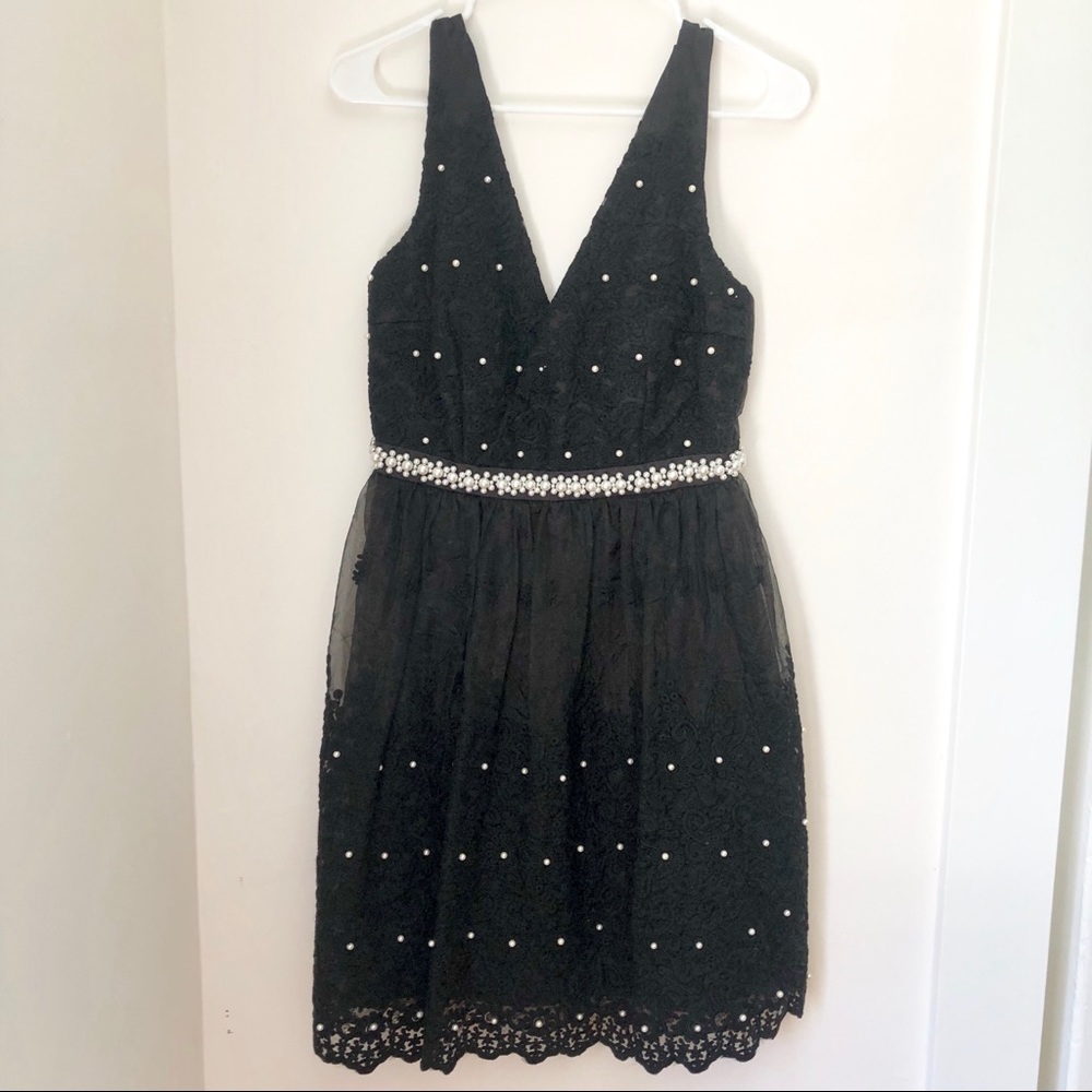 Black dress with lace and pearl detail